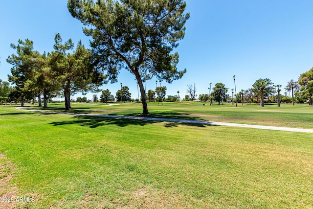 1108 N Oro Vis, Litchfield Park, AZ 85340 - view of community with a lawn