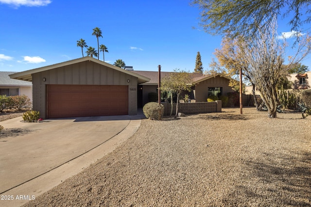 single story home featuring a garage