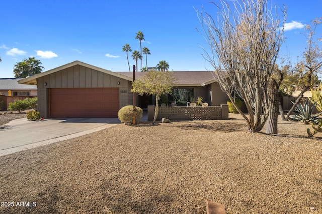 single story home featuring a garage