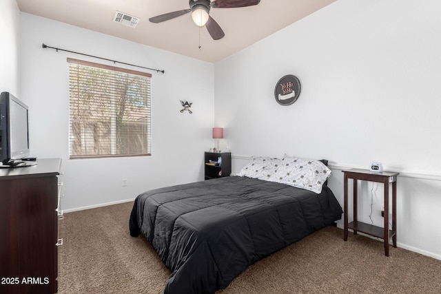 bedroom with baseboards, a ceiling fan, carpet flooring, and visible vents