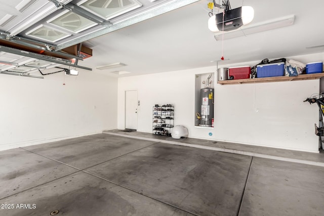 garage with a garage door opener and water heater