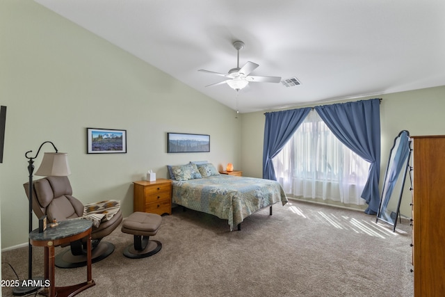 bedroom featuring vaulted ceiling, visible vents, carpet floors, and ceiling fan