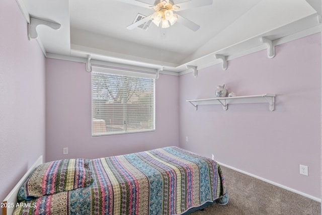 bedroom featuring vaulted ceiling, carpet flooring, and a ceiling fan