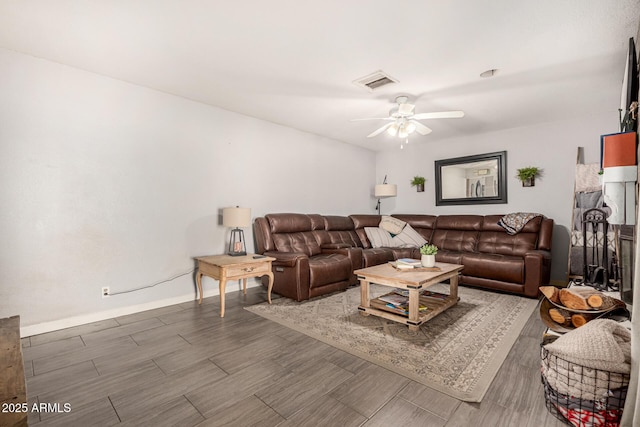 living room with ceiling fan