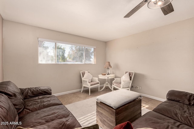 tiled living room featuring ceiling fan