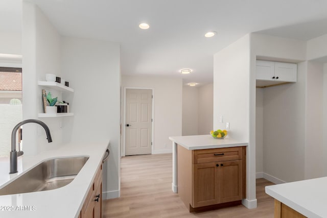 14239 N Edgeworth Dr Unit A, Fountain Hills, AZ 85268 - kitchen featuring a sink, light wood finished floors, open shelves, light countertops, and recessed lighting