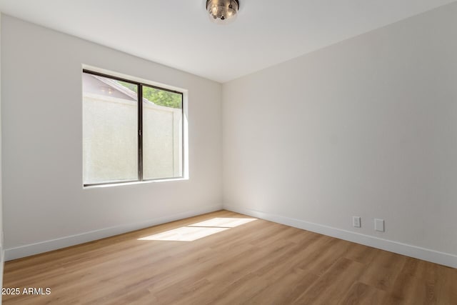 14239 N Edgeworth Dr Unit A, Fountain Hills, AZ 85268 - spare room with light wood-style flooring and baseboards