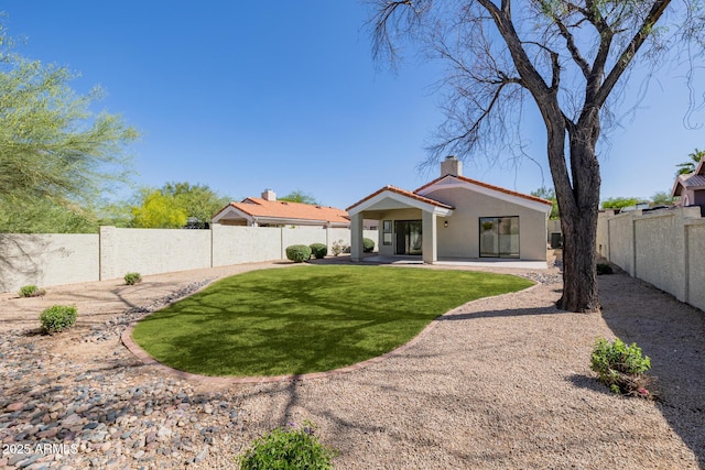 14239 N Edgeworth Dr Unit A, Fountain Hills, AZ 85268 - back of property featuring a chimney, a patio area, and stucco siding