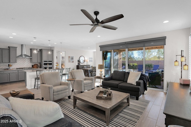 living room with ceiling fan