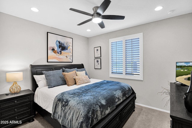 carpeted bedroom with ceiling fan