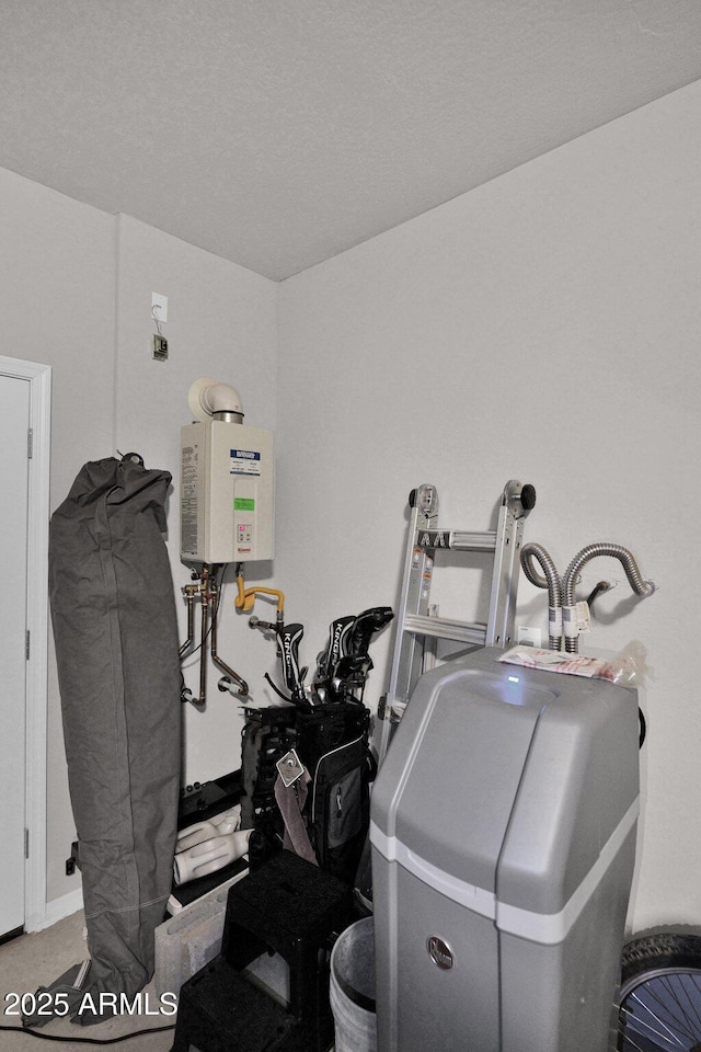 interior space featuring a textured ceiling and water heater