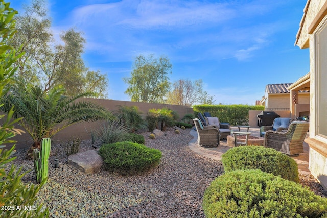 view of yard featuring a patio area and an outdoor living space