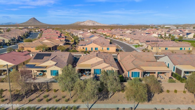 drone / aerial view featuring a mountain view