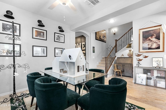 office space featuring ceiling fan and light wood-type flooring