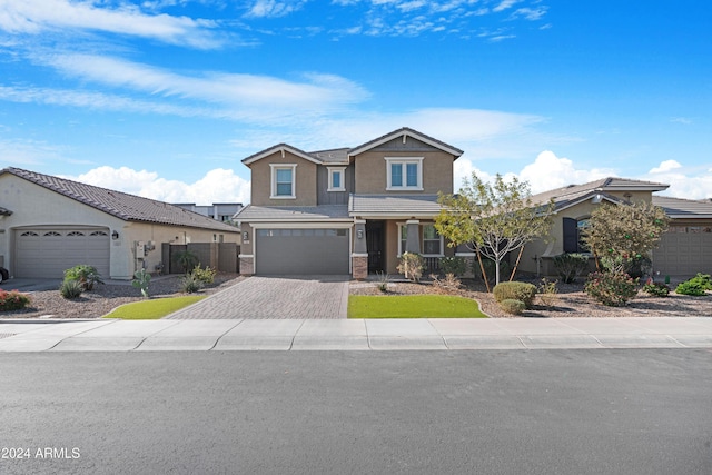 view of front of property with a garage