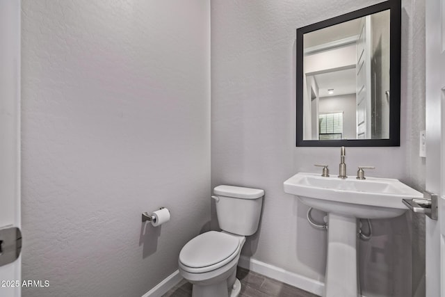 17118 N 50th Way, Scottsdale, AZ 85254 - half bathroom featuring toilet and wood finished floors
