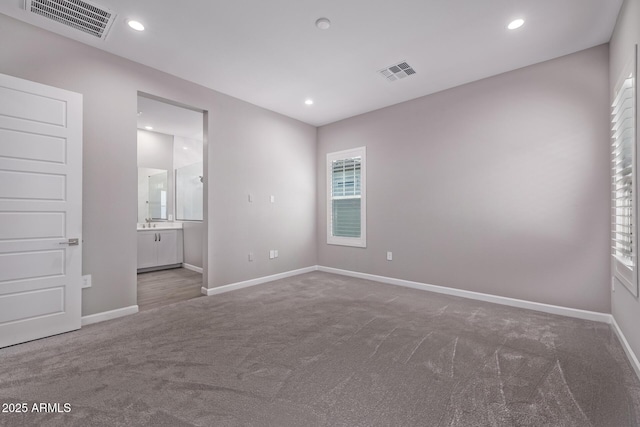17118 N 50th Way, Scottsdale, AZ 85254 - carpeted empty room with plenty of natural light and recessed lighting