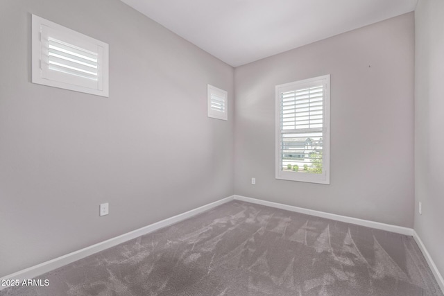 17118 N 50th Way, Scottsdale, AZ 85254 - carpeted empty room featuring baseboards