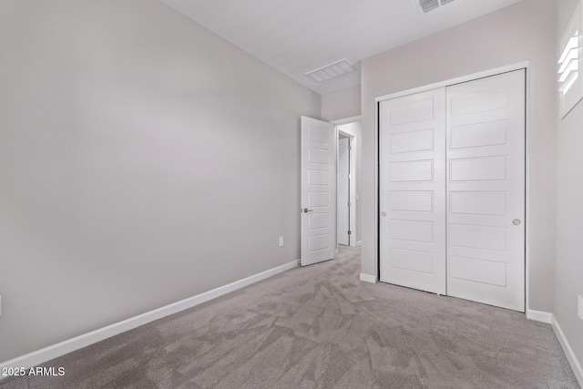 17118 N 50th Way, Scottsdale, AZ 85254 - unfurnished bedroom featuring carpet flooring and a closet