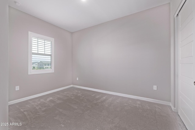 17118 N 50th Way, Scottsdale, AZ 85254 - carpeted empty room featuring baseboards and a smoke detector