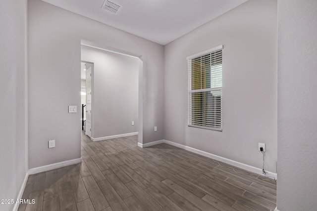 17118 N 50th Way, Scottsdale, AZ 85254 - spare room with dark wood-type flooring and baseboards