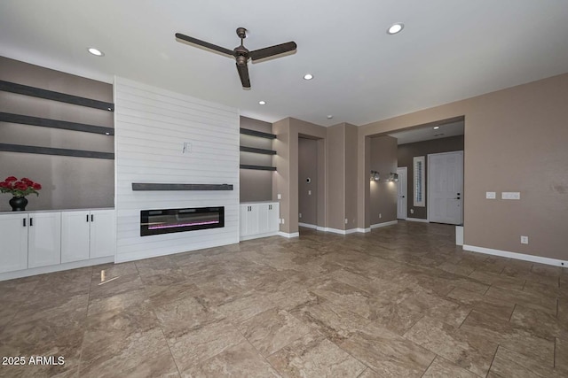 unfurnished living room featuring a fireplace and ceiling fan