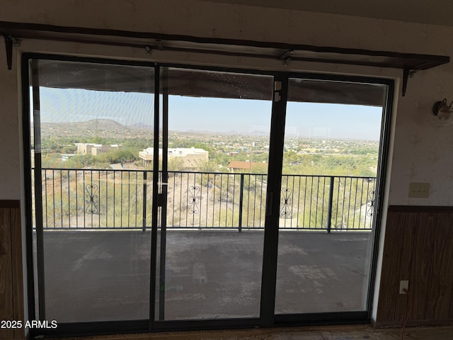 525 Constellation Rd, Wickenburg, AZ 85390 - doorway to outside featuring a wainscoted wall and a mountain view