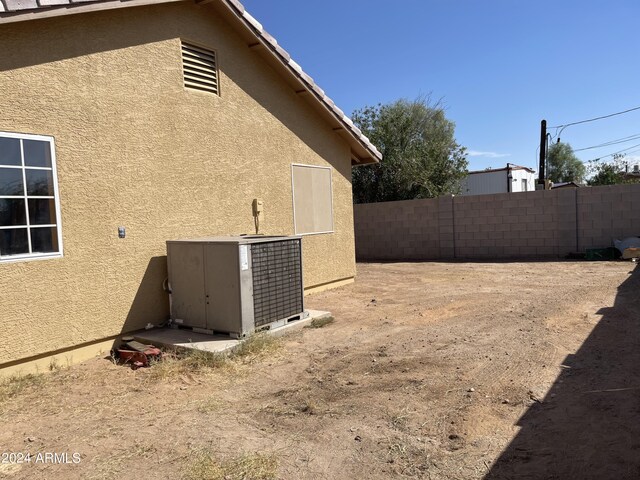 view of yard featuring central AC