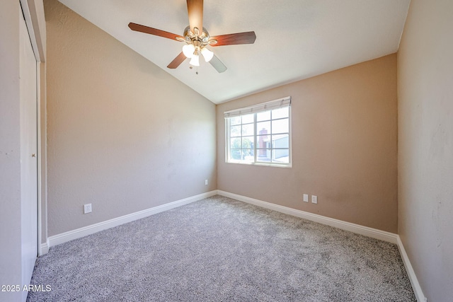 2301 E University Dr Unit 210, Mesa, AZ 85213 - unfurnished room featuring vaulted ceiling, carpet flooring, and ceiling fan