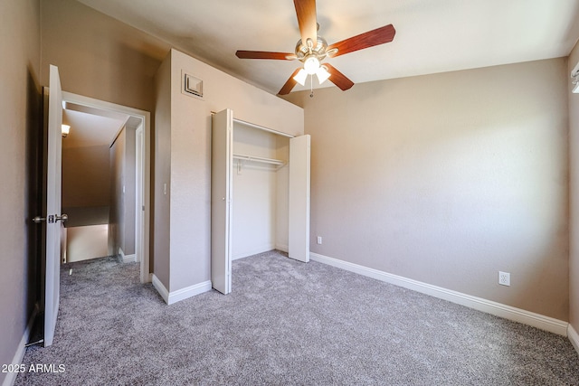2301 E University Dr Unit 210, Mesa, AZ 85213 - unfurnished bedroom with carpet flooring, a closet, and a ceiling fan