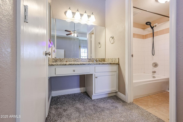 2301 E University Dr Unit 210, Mesa, AZ 85213 - bathroom with shower / tub combination, vanity, a ceiling fan, tile patterned floors, and a textured wall