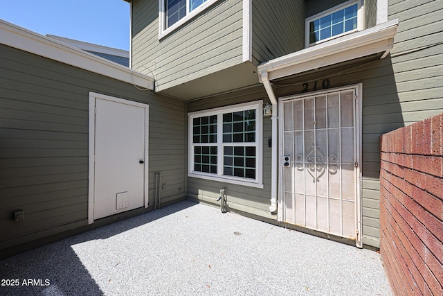 2301 E University Dr Unit 210, Mesa, AZ 85213 - doorway to property featuring a patio area