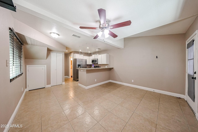 2301 E University Dr Unit 210, Mesa, AZ 85213 - unfurnished living room featuring ceiling fan and light tile patterned floors