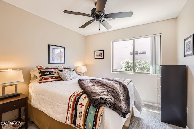 bedroom with visible vents, baseboards, a ceiling fan, and carpet floors