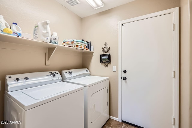 laundry room with laundry area, independent washer and dryer, and visible vents