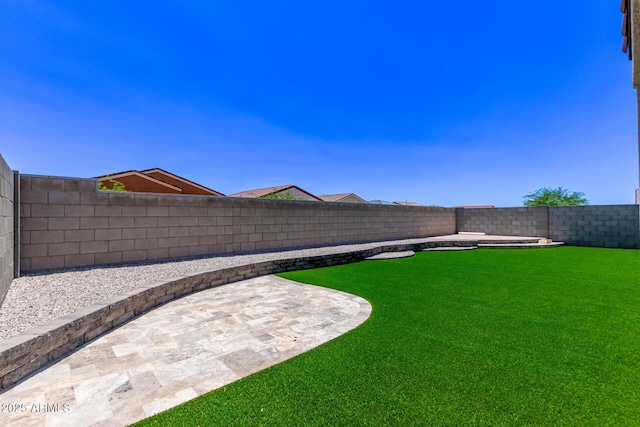 2347 W Sunland Ave, Phoenix, AZ 85041 - fenced backyard featuring a patio