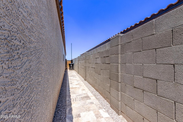 2347 W Sunland Ave, Phoenix, AZ 85041 - view of side of property with a tiled roof and stucco siding