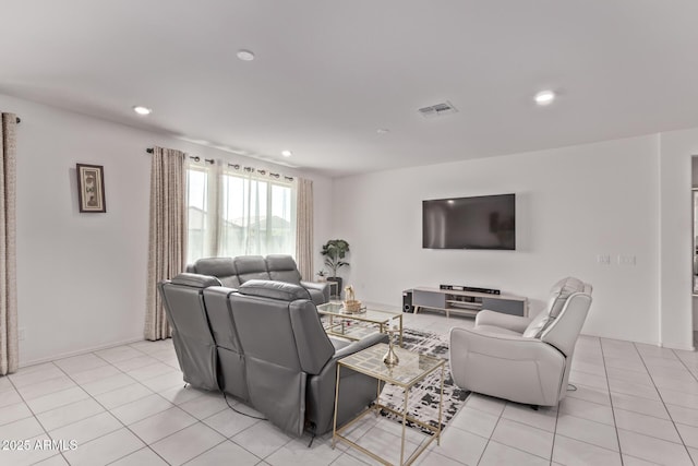 2347 W Sunland Ave, Phoenix, AZ 85041 - living area featuring light tile patterned flooring and recessed lighting