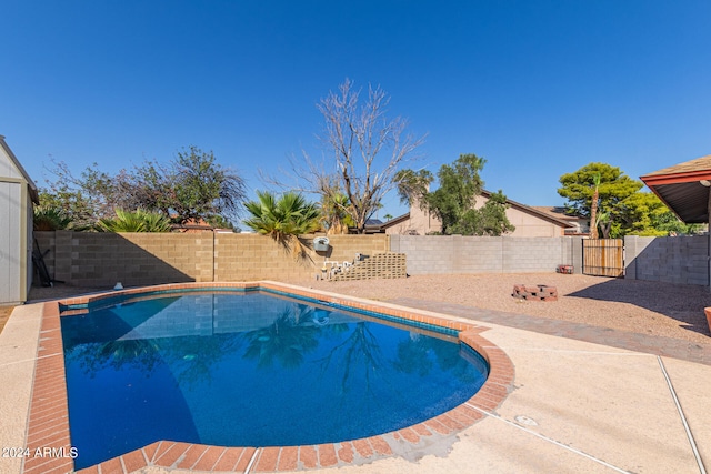 view of pool featuring a patio area