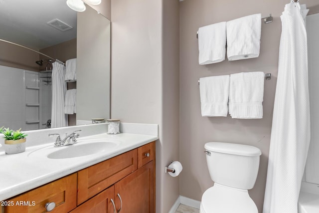 1920 E Bell Rd Unit 1189, Phoenix, AZ 85022 - bathroom with vanity, toilet, and baseboards