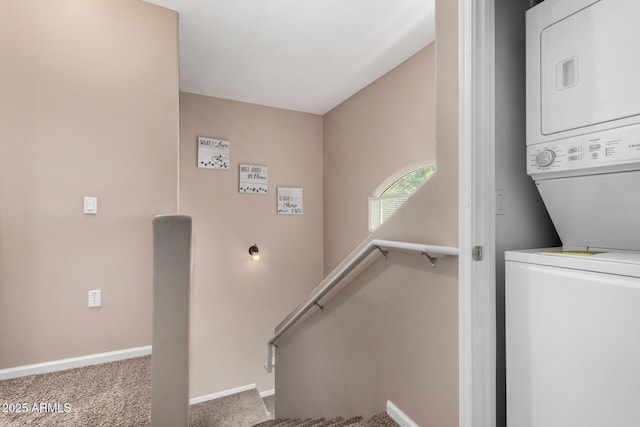 1920 E Bell Rd Unit 1189, Phoenix, AZ 85022 - laundry area with stacked washer and clothes dryer, carpet flooring, and baseboards