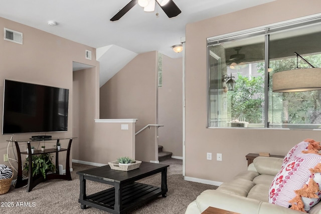 1920 E Bell Rd Unit 1189, Phoenix, AZ 85022 - carpeted living room with ceiling fan, baseboards, and stairs
