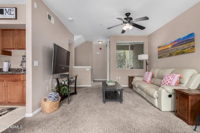 1920 E Bell Rd Unit 1189, Phoenix, AZ 85022 - living room featuring carpet flooring, a ceiling fan, and baseboards