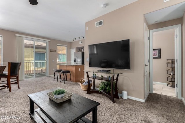1920 E Bell Rd Unit 1189, Phoenix, AZ 85022 - living area with light colored carpet and baseboards