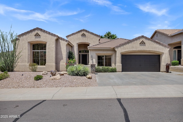 10310 N 135th Way, Scottsdale, AZ 85259 - mediterranean / spanish-style home featuring stucco siding, a garage, a tiled roof, and driveway