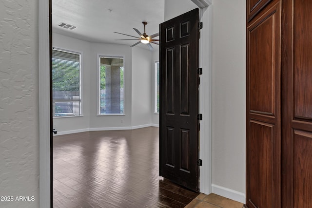 10310 N 135th Way, Scottsdale, AZ 85259 - foyer entrance featuring a ceiling fan, dark wood finished floors, and a textured wall