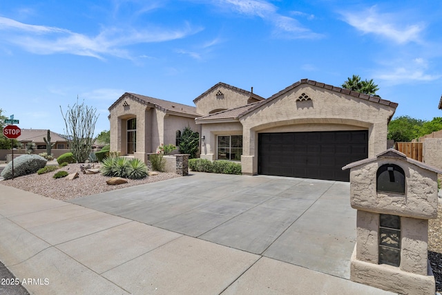 10310 N 135th Way, Scottsdale, AZ 85259 - mediterranean / spanish home featuring driveway, a garage, stucco siding, and a tile roof