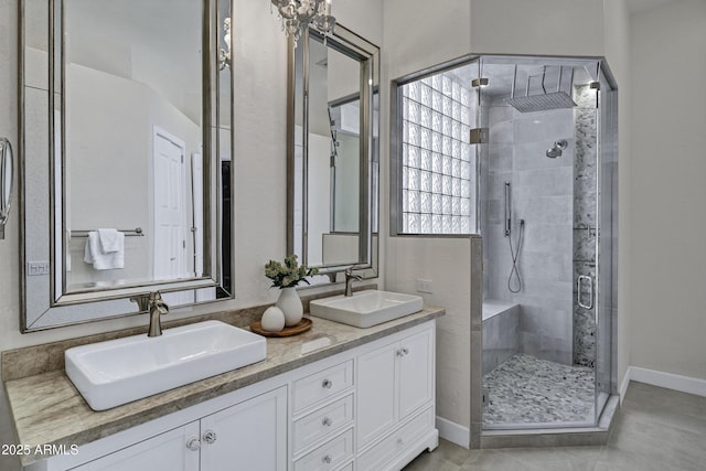 10310 N 135th Way, Scottsdale, AZ 85259 - full bathroom featuring a stall shower, double vanity, and tile patterned floors