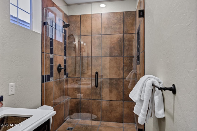 10310 N 135th Way, Scottsdale, AZ 85259 - bathroom with a textured wall, a stall shower, and vanity