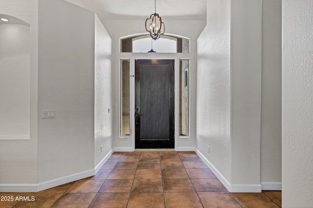 10310 N 135th Way, Scottsdale, AZ 85259 - foyer entrance featuring a chandelier and dark tile patterned floors